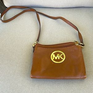 Michael Kors leather brown crossbody bag. Has some wear. Great shape otherwise.